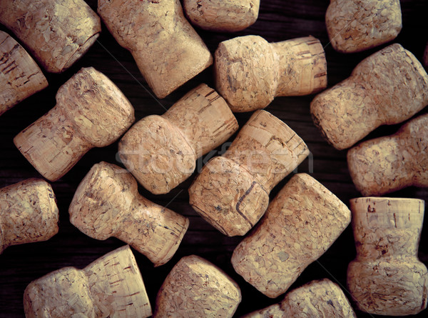 Dated wine bottle corks on the wooden background Stock photo © dashapetrenko