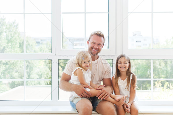 Portrait of father with his daughters Stock photo © dashapetrenko