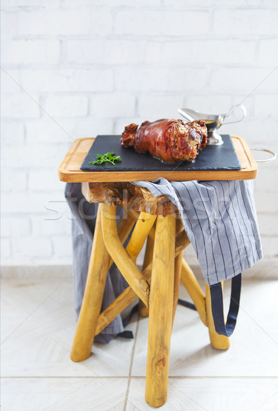 Roasted pork leg (rulka) served with garlic sauce on the wooden  Stock photo © dashapetrenko