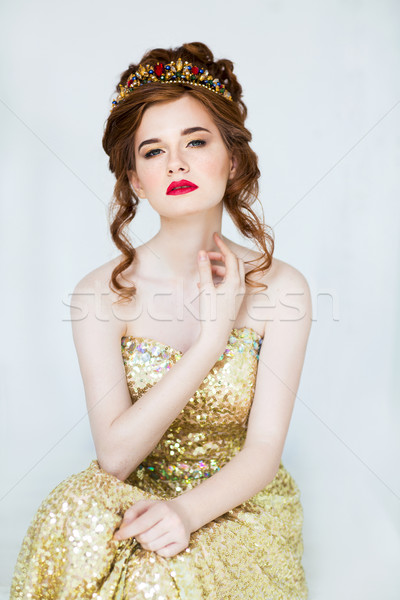 Beautiful redhaired fashion model posing in evening dress and in Stock photo © dashapetrenko