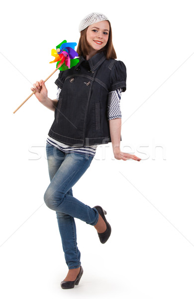 Young cute brunette girl wind turbine toy Stock photo © dashapetrenko