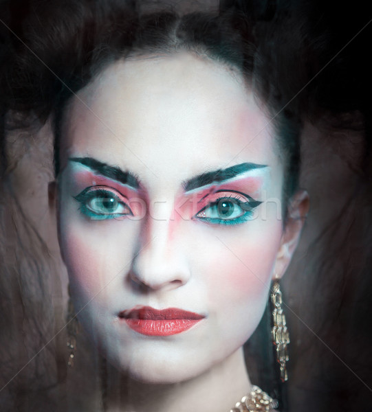 Close up stylized portrait of a Japanese geisha with bright make Stock photo © dashapetrenko