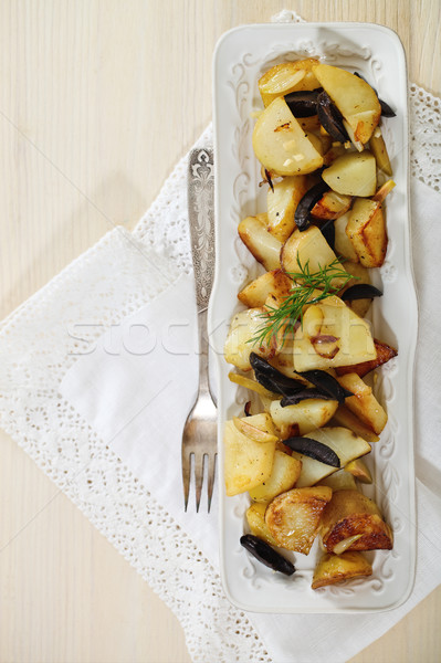 Potato salad with olives, onion, dill and olive oil Stock photo © dashapetrenko