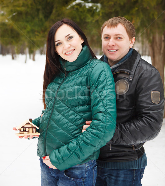 Happy couple having fun in the winter park Stock photo © dashapetrenko