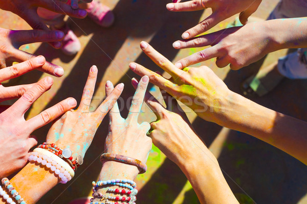 Friends putting their hands together in a sign of unity and team Stock photo © dashapetrenko