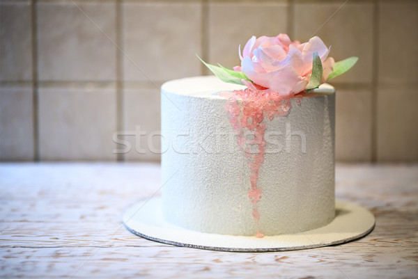 Wedding cake beautiful decorated with pink roses and sugar Stock photo © dashapetrenko