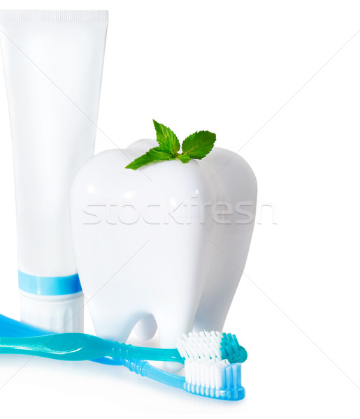 Tooth brushes with mint, tooth paste and dental floss isolated o Stock photo © dashapetrenko