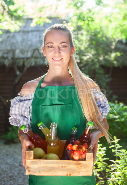 Woman holding wooden box with bottles of lemonade  Stock photo © dashapetrenko