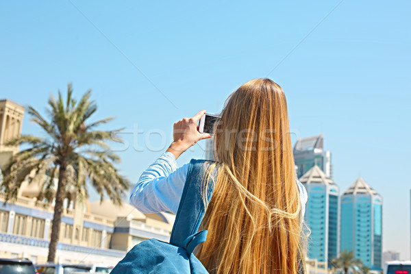 Woman taking mobile photo of the Central Souq in Sharjah City, U Stock photo © dashapetrenko