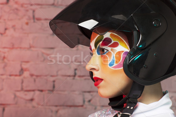 Beautiful young model with bright creative make up with helmet Stock photo © dashapetrenko