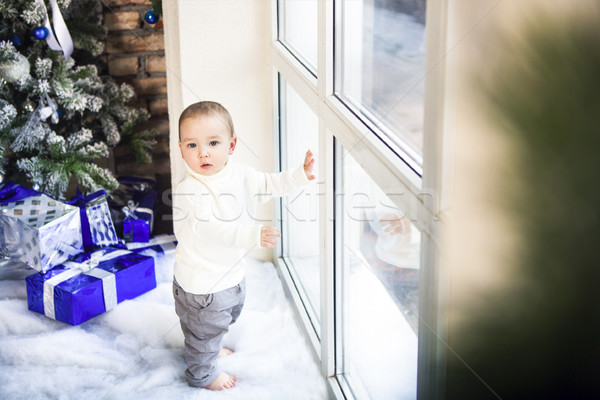 Funny one year old baby baby boy on bright festive background Stock photo © dashapetrenko