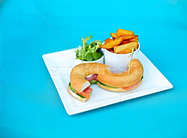 Salmon bagel salad and roast potato Stock photo © dashapetrenko