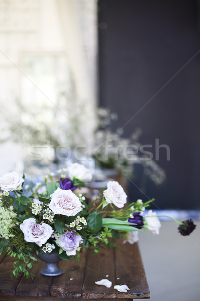 Bouquets of pink and violet flowers on a table Stock photo © dashapetrenko