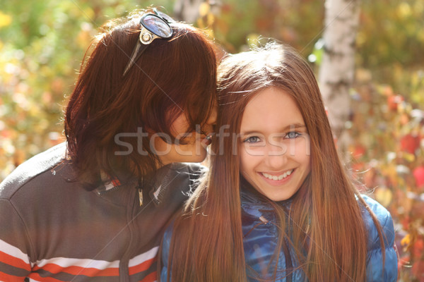 Mother and daughter in autumn park Stock photo © dashapetrenko