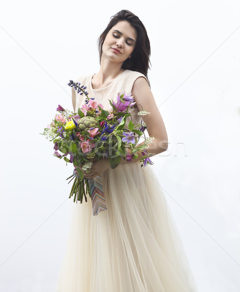 Beautiful bride outdoors with flower bouquet Stock photo © dashapetrenko