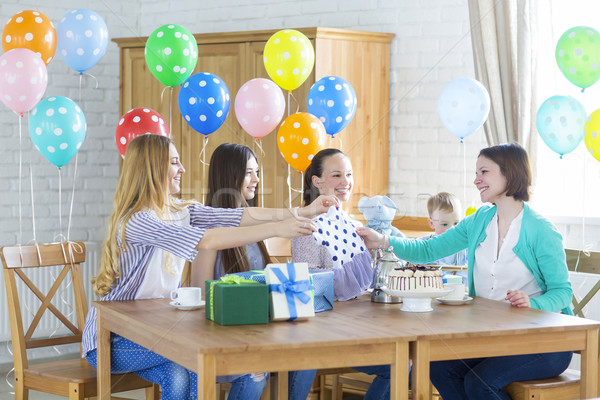 Pregnant woman with friends at a baby shower Stock photo © dashapetrenko