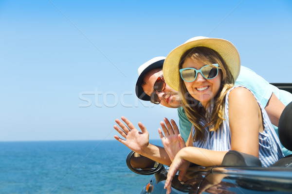 Portrait of a smiling couple at beach in the car Stock photo © dashapetrenko