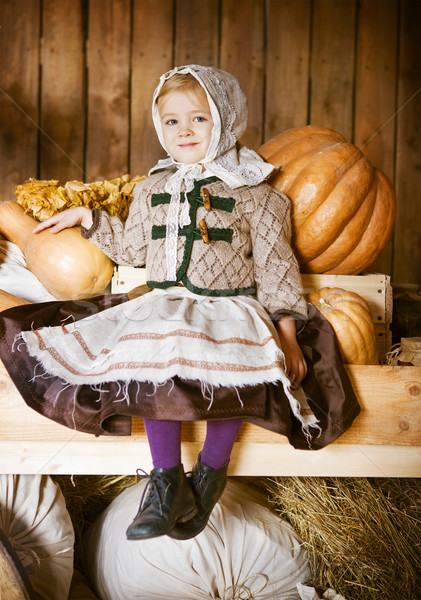 Vintage styled photo of little girl in farm Stock photo © dashapetrenko
