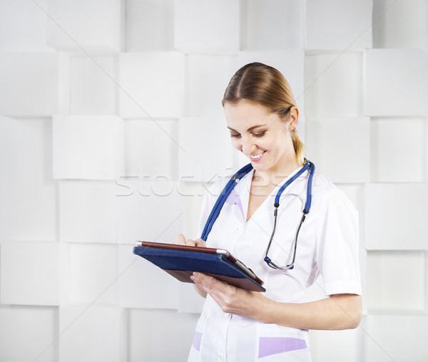 Stock photo: Female doctor with tablet computer