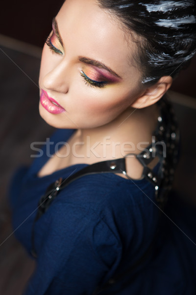 Beautiful young brunette woman with fantasy makeup and hair dres Stock photo © dashapetrenko