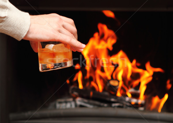 Hombre potable whisky vidrio negro caliente Foto stock © dashapetrenko