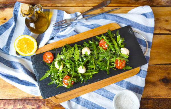 Vers voorjaar salade tomaten olijfolie Stockfoto © dashapetrenko