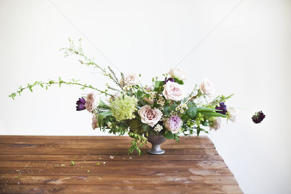 Bouquets of pink and violet flowers on a table Stock photo © dashapetrenko
