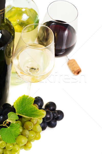 Glasses of white and rose wine and grapes over white Stock photo © dashapetrenko