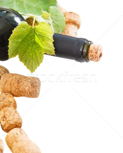 Bottle corks and bottle on the white background Stock photo © dashapetrenko