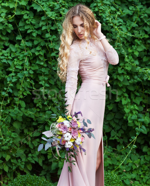 Bride holding the wedding bouquet with succulent flowers Stock photo © dashapetrenko