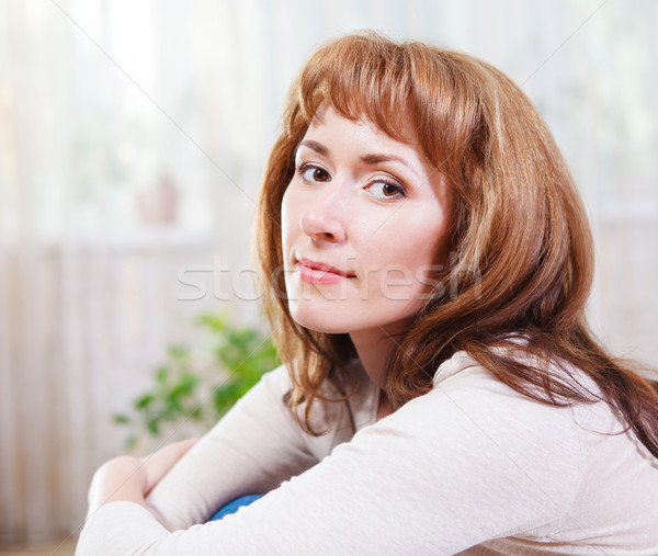 Portrait of happy young woman indoor Stock photo © dashapetrenko