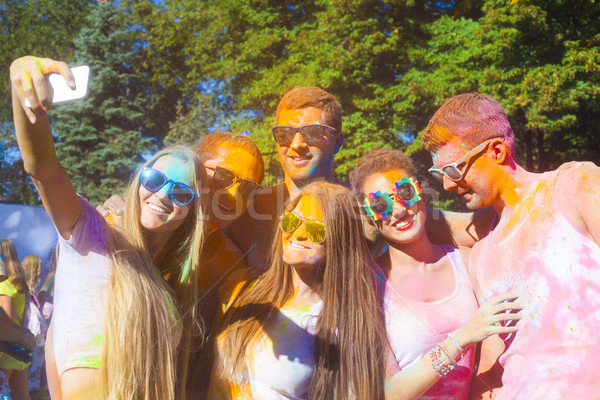 Stock photo: Portrait of happy friends on holi color festival