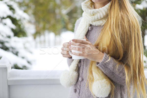 Young beautiful woman with blond hair outdoor with cup Stock photo © dashapetrenko