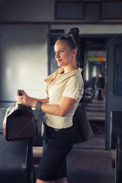 Woman with a suitcase in the retro train Stock photo © dashapetrenko