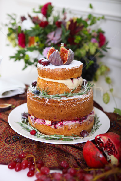 Cake, cupcakes, sweetness and flowers Stock photo © dashapetrenko
