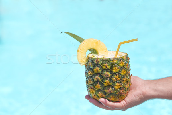 Exotic pineapple cocktail near pool. Pina colada Stock photo © dashapetrenko