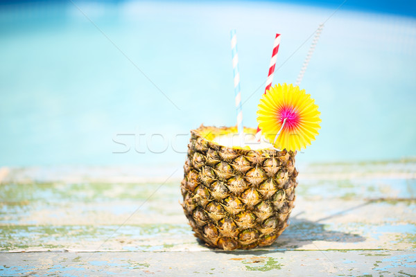 Egzotikus ananász koktél medence pina colada nap Stock fotó © dashapetrenko