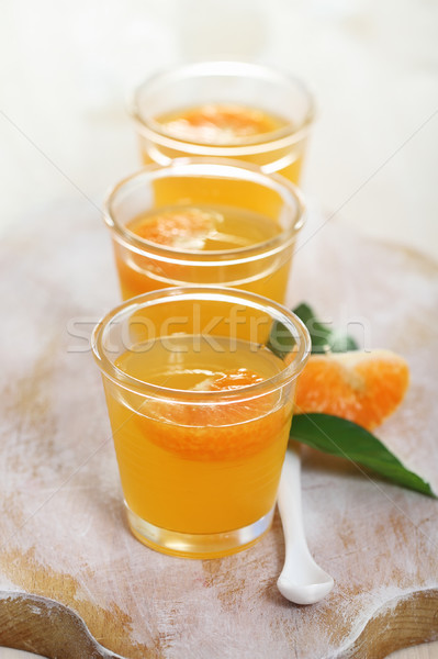 Gyümölcs mandarin zselé üveg tál asztal Stock fotó © dashapetrenko