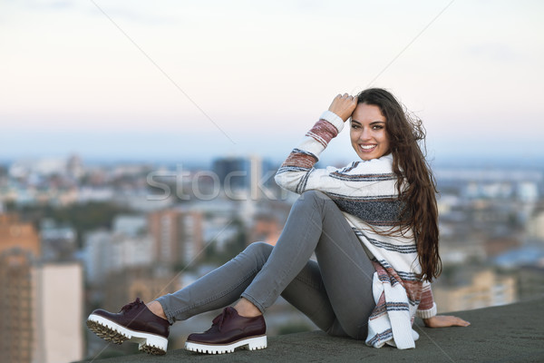 Young woman outdoors on city background in sunny day Stock photo © dashapetrenko