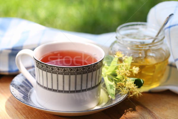 Linden honey in a jar with linden flowers  Stock photo © dashapetrenko