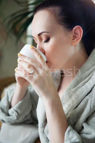 Relaxed woman drinking tea at spa resort Stock photo © dashapetrenko