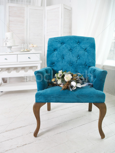 Wedding bouquet with ranunculus on the blue armchair Stock photo © dashapetrenko