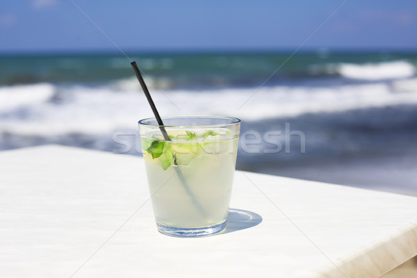 Cocktail glass on sea background Stock photo © dashapetrenko