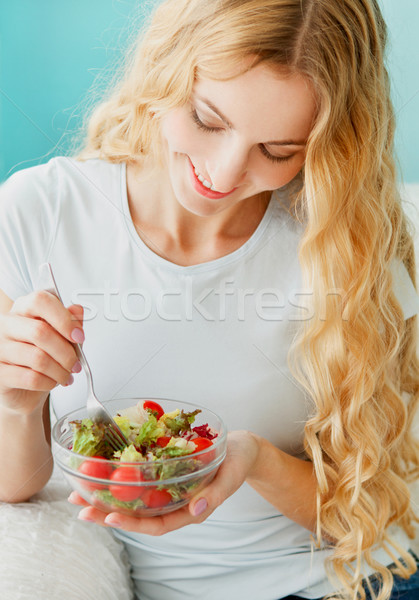 Female model eating green salad Stock photo © dashapetrenko