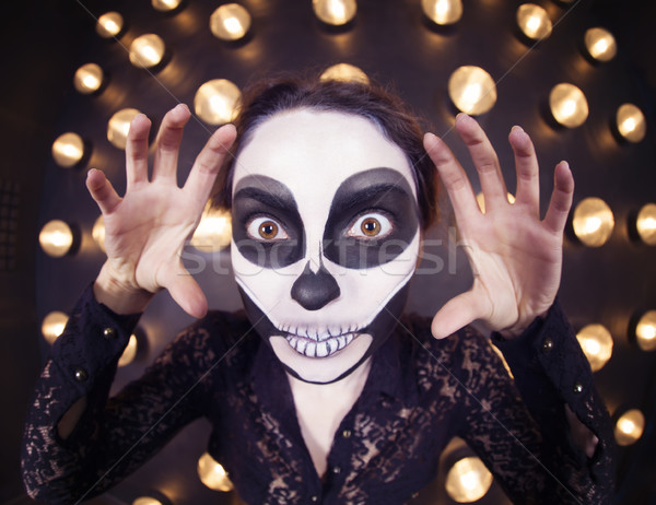 Beautiful woman painted as skeleton. Halloween theme Stock photo © dashapetrenko