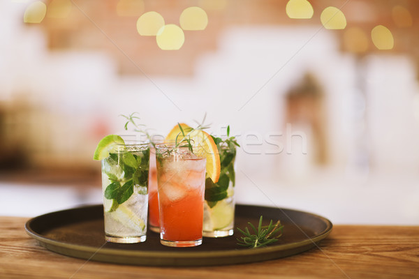 Two cocktail glasses on tray in the bar Stock photo © dashapetrenko