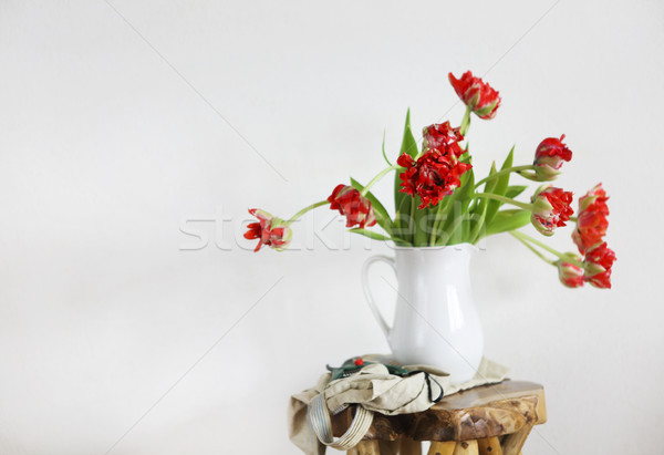 Tulips bouquet in white vase on wooden rustic chair  Stock photo © dashapetrenko