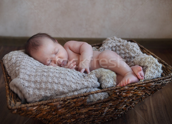 One month old baby boy in the basket Stock photo © dashapetrenko