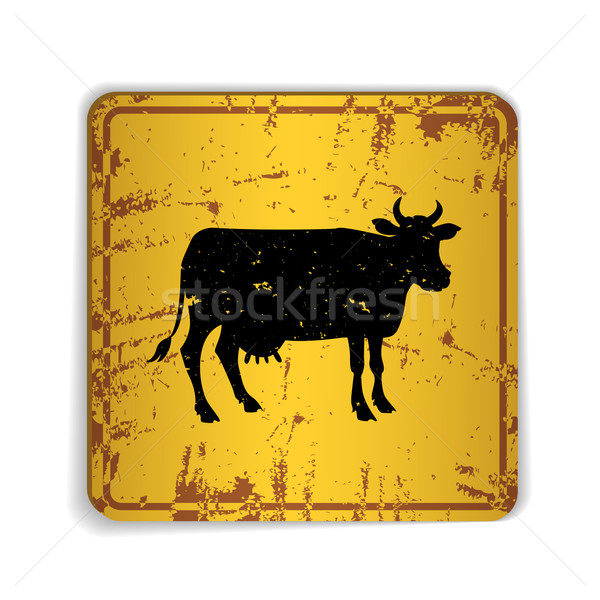 Old skratched yellow road sign with cow silhouette.  Stock photo © Dashikka