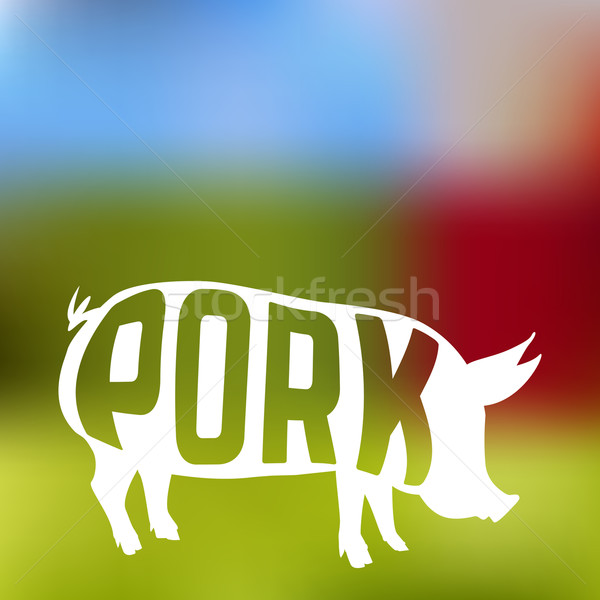 Stock photo: Pig silhouette with text inside on blur farm background